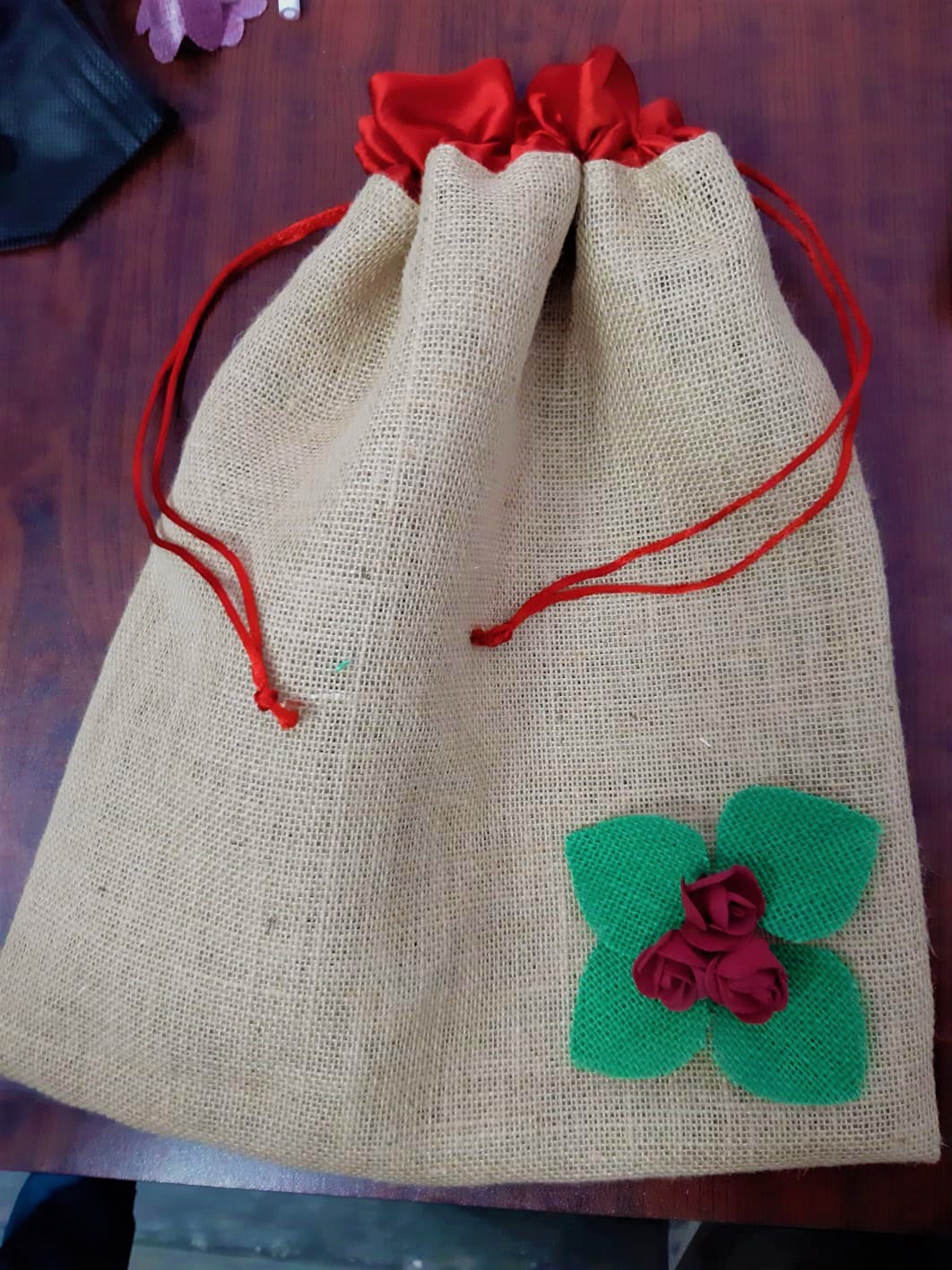 Jute pouch with satin top