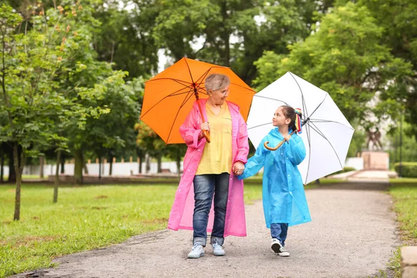 Umbrellas, rainsuits and Rainc..
